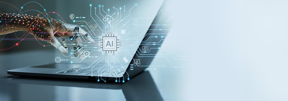 Robot hand working on laptop