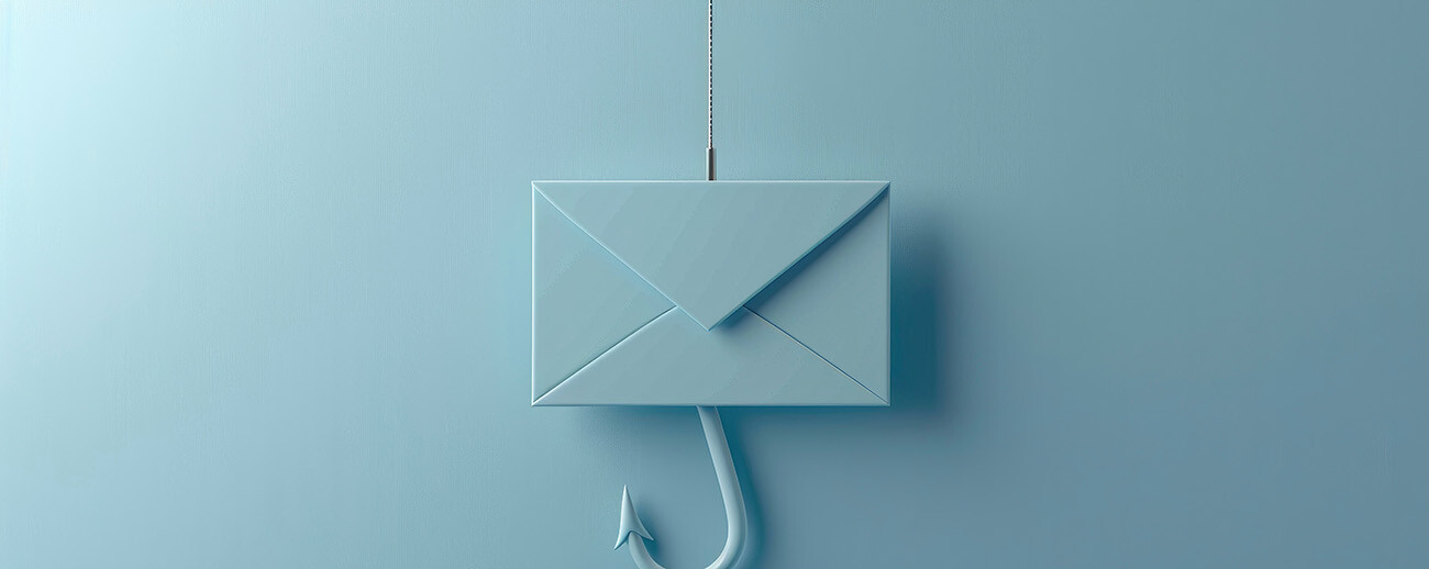 letter with fish hook attached