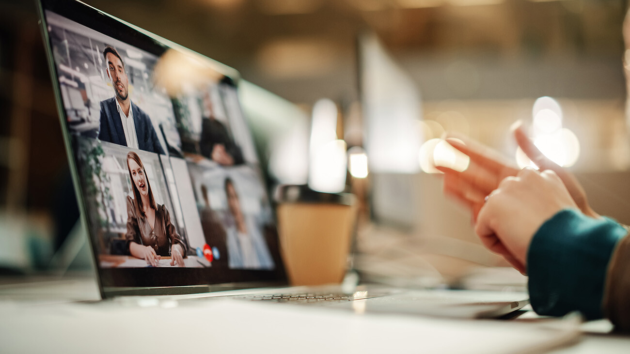 Employees meeting remotely via computer