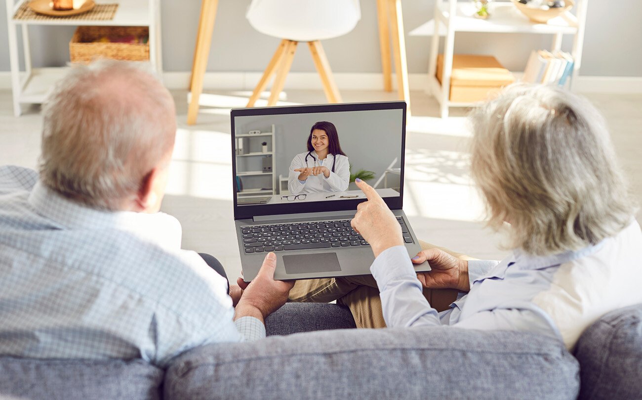 Couple receiving health advice over video call